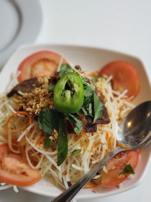 Photo of Golden Era Vegan Restaurant - San Francisco, CA, US. Papaya salad. Perfect sharing size for an appetizer. Would be good for probably 4 people comfortably.