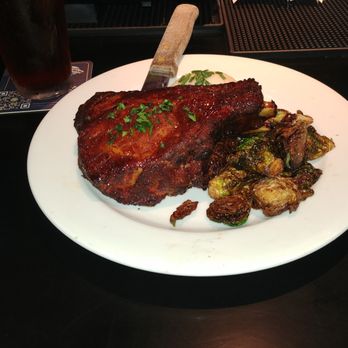 Kozak's Laketown Grill - Bone-in ribeye chop, hickory smoked to perfection. - New American Near Me - Smithville, Missouri