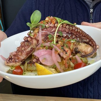 Soleil Bistro & Bar - Boiled Octopus on pickled onion and potato salad - Waffles Near Me - Calgary, Alberta Soleil Bistro & Bar - Boiled Octopus on pickled onion and potato salad - Waffles Near Me - Calgary, Alberta
