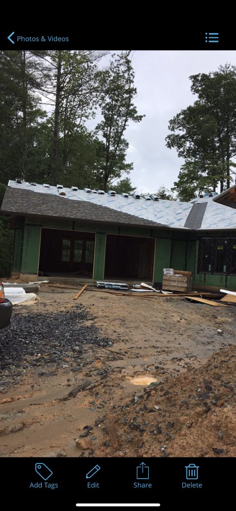 Slide of The Roofing Company