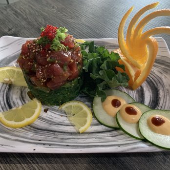 Sushi Bombs - Seaweed salad with spicy tuna... and their delicious sauce. - Japanese Near Me - Miami Lakes, Florida Sushi Bombs - Seaweed salad with spicy tuna... and their delicious sauce. - Japanese Near Me - Miami Lakes, Florida