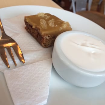 The Shack - Ginger oat slice with a side of yogurt - Coffee & Tea Near Me - Raglan, WKO