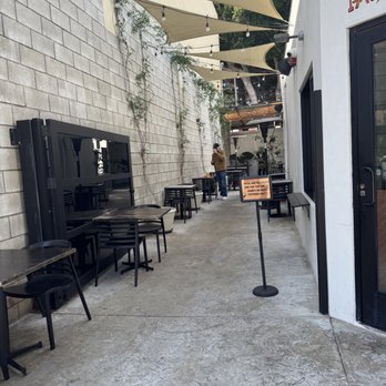 Augie's on Main - Cute alley seating. Restroom in the ack - Burgers Near Me - Santa Monica, California Augie's on Main - Cute alley seating. Restroom in the ack - Burgers Near Me - Santa Monica, California