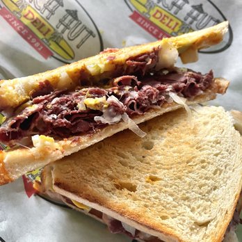 Beach Hut Deli - Righteous Reuben - Kind of a Reuben-Cuban mashup. Pickles and Mustard were great addition to the standard Reuben style - Delis Near Me - Bend, Oregon Beach Hut Deli - Righteous Reuben - Kind of a Reuben-Cuban mashup. Pickles and Mustard were great addition to the standard Reuben style - Delis Near Me - Bend, Oregon