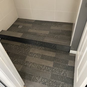 Hafner Tile - a view of a tiled bathroom - General Contractors Near Me