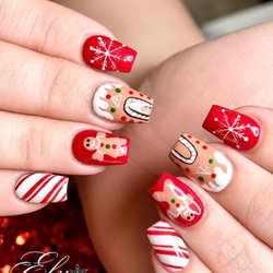 Ely Nails & Spa - Festive Christmas nails featuring gingerbread candy canes, and snowflakes-hand-painted with love at Ely Nails & Spa!