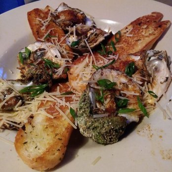 Razzoo's Cajun Cafe - Grilled oysters with garlic. - Cajun/Creole Near Me - Cedar Hill, Texas