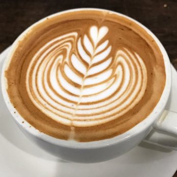 Frisson Espresso - "wing tulip" design - Coffee & Tea Near Me - New York, New York Frisson Espresso - "wing tulip" design - Coffee & Tea Near Me - New York, New York