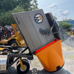 C & C Sales & Services - Easy dumping of a Walker Mower GHS hopper into a Square Barrel.