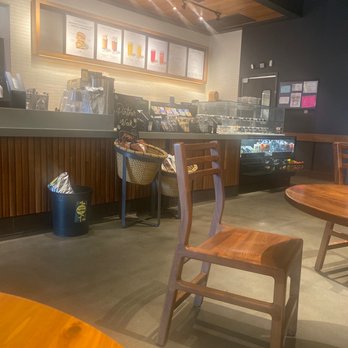 Starbucks - a coffee shop with wooden tables and chairs - Coffee & Tea Near Me - Rincon, Georgia Starbucks - a coffee shop with wooden tables and chairs - Coffee & Tea Near Me - Rincon, Georgia