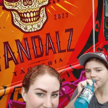 Vandalz Seattle - two women drinking a drink - Food Trucks Near Me