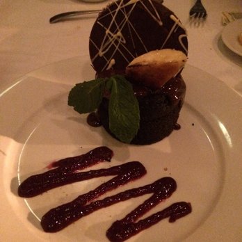 MEAL - Flourless chocolate cake with blackberry pureee and carmelized bananas - New American Near Me - Nutley, New Jersey MEAL - Flourless chocolate cake with blackberry pureee and carmelized bananas - New American Near Me - Nutley, New Jersey