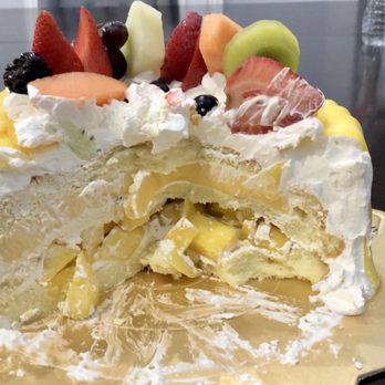 Six Ping - Mango Carnival Cake with mango and egg pudding filling. DELICIOUS! - Bakeries Near Me - Houston, Texas Six Ping - Mango Carnival Cake with mango and egg pudding filling. DELICIOUS! - Bakeries Near Me - Houston, Texas