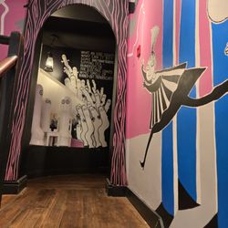 The Moomin Shop - murals along the stairs to get to the store