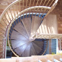 Brebes Builders - Spiral staircase. Installation by Brebes Builders. Finish by VanLandingham.