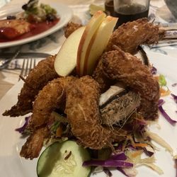 La Pigua - Coconut shrimp with apples in a coconut