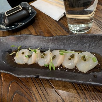 Nami Sushi - Scallop carpaccio appetizer, topped with capers and greens with yuzu sauce - Japanese Near Me - New York, New York