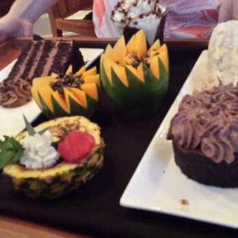 Tommy Bahama - Dessert tray..........another pic of the coconut cake on the top right. - Seafood Near Me - Kihei, Hawaii Tommy Bahama - Dessert tray..........another pic of the coconut cake on the top right. - Seafood Near Me - Kihei, Hawaii