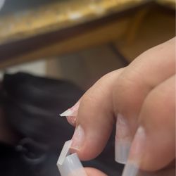 Lavender Nails - The tips she put on, the sidewalls weren't even lined up and barely glued on and they broke off in the chair.