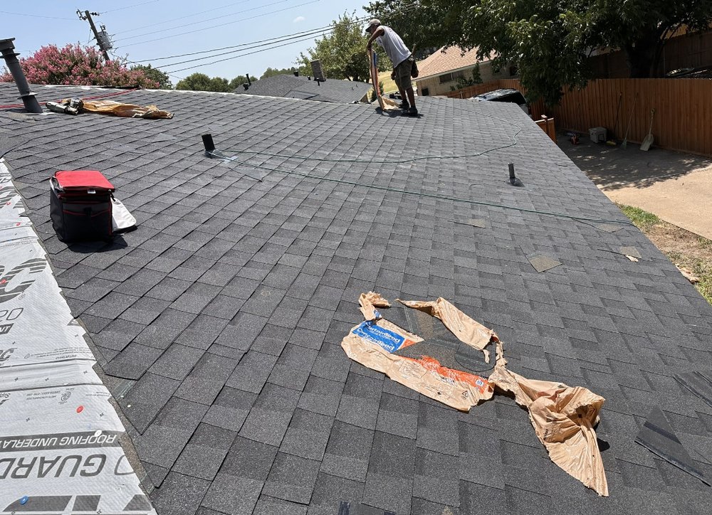 Slide of Homer’s Roofing & Construction