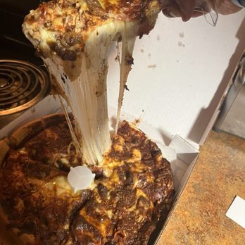 Blackthorn Pub and Pizza - Look at that cheese pull, this is what sold us. - Pubs Near Me - St. Louis, Missouri Blackthorn Pub and Pizza - Look at that cheese pull, this is what sold us. - Pubs Near Me - St. Louis, Missouri