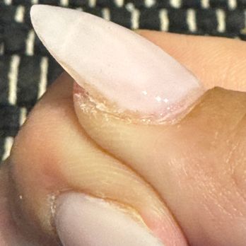 KK Nails Covina - Uneven placement of the gelx nail and uncleaned cuticles from a new set - Nail Salons Near Me - Covina, California KK Nails Covina - Uneven placement of the gelx nail and uncleaned cuticles from a new set - Nail Salons Near Me - Covina, California