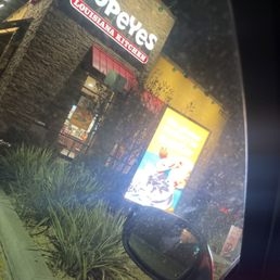 Exterior outside entrance of Popeyes Louisiana Kitchen - Compton, California Exterior outside entrance of Popeyes Louisiana Kitchen - Compton, California
