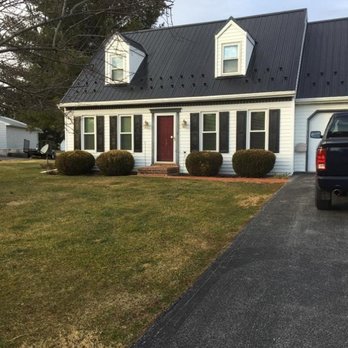 Cook's Landing Construction - a white house with a black roof - General Contractors Near Me - Peach Bottom, Pennsylvania Cook's Landing Construction - a white house with a black roof - General Contractors Near Me - Peach Bottom, Pennsylvania