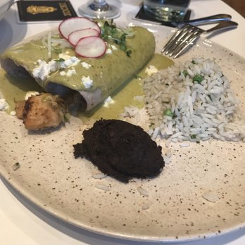 Xochi - Enchiladas of the day- nothing exciting for $22, especially considering the 2 spoons of beans and rice you get LOL! - Mexican Near Me - Houston, Texas Xochi - Enchiladas of the day- nothing exciting for $22, especially considering the 2 spoons of beans and rice you get LOL! - Mexican Near Me - Houston, Texas