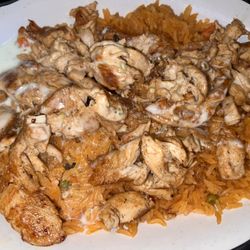 Rodeo’s Mexican Restaurant - Arroz con pollo (grilled chicken on bed of rice w/ queso on top) SO GOOD!