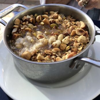 Bouchon - Steel-cut Irish Oatmeal w/ peach compote and roasted nuts....highly recommended. - French Near Me - Las Vegas, Nevada Bouchon - Steel-cut Irish Oatmeal w/ peach compote and roasted nuts....highly recommended. - French Near Me - Las Vegas, Nevada