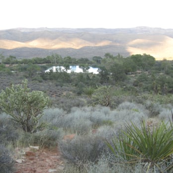 Spring Mountain Ranch State Park - Hiking towards the mountains, looking back towards the pond. - Parks Near Me - Blue Diamond, Nevada
