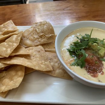 Picnik - Burnet Road - Almond flour chips, cashew queso with a dabble of guacamole. - New American Near Me - Austin, Texas