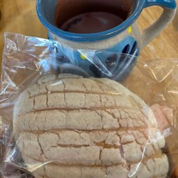 Fresh pan dulce as a starter with delicious hot chocolate