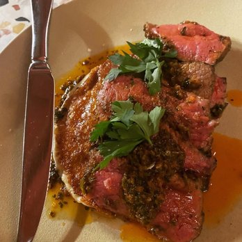 The Salted Pig - Wanderer Steak w/ provoleta cheese & Red Chimichurri topped w/  cilantro - Gastropubs Near Me - Riverside, California
