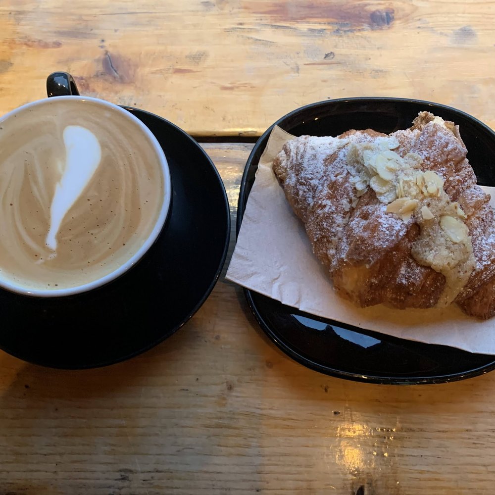 latte + almond croissant latte + almond croissant
