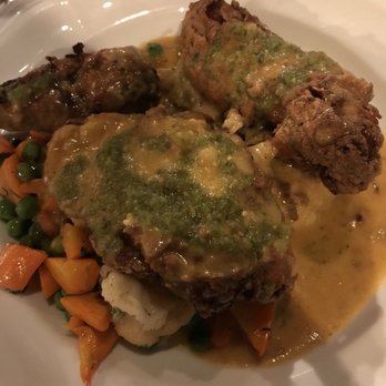 Noco Provisions - Fried chicken dinner with salsa verde and chorizo gravy and mashed potatoes.  :-) - Bars Near Me - Grand Rapids, Michigan