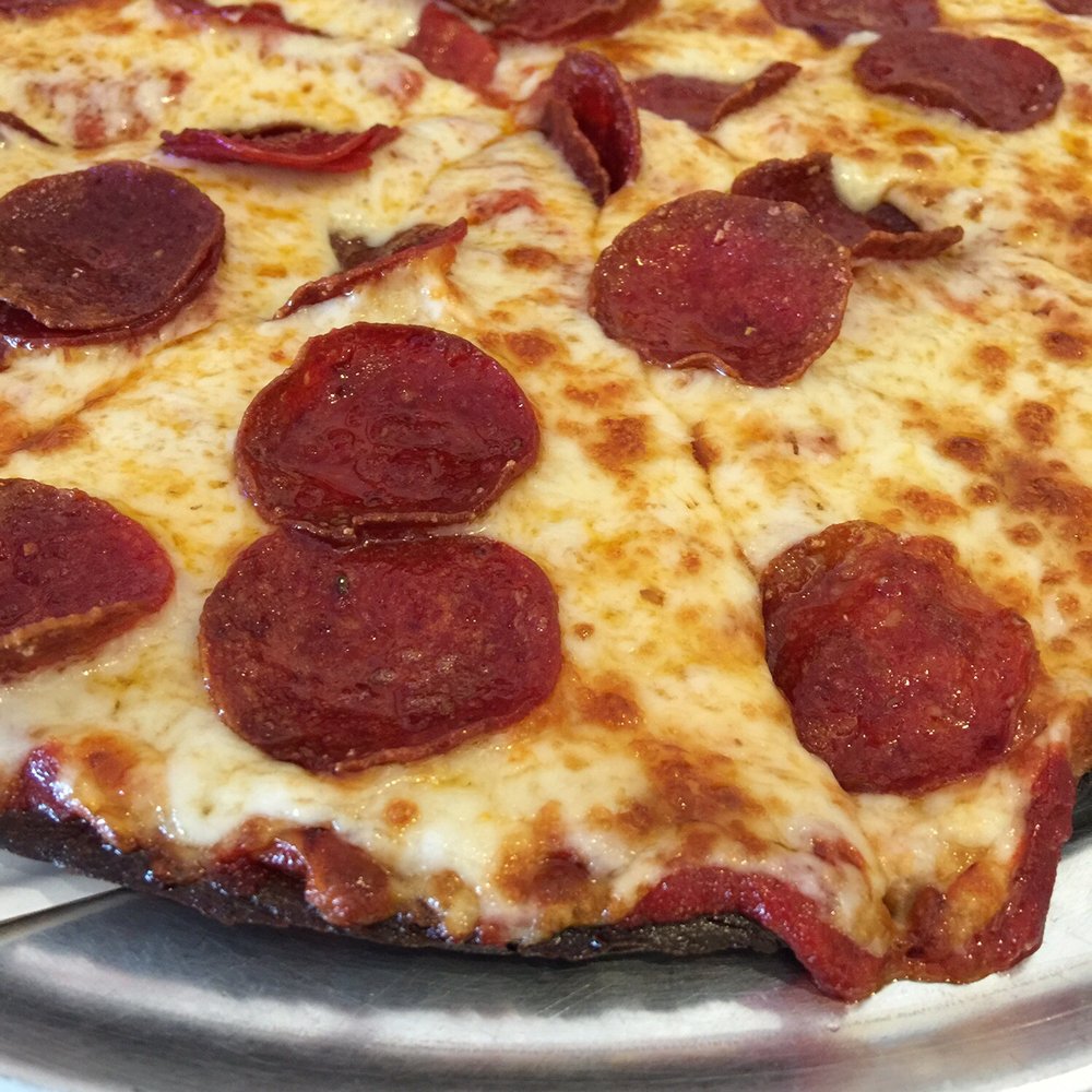 Pizza Express - Gluten free pizza. Hate when the edges get burned. I just ate around it. - Pizza Near Me - Paso Robles, California