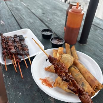 Bar-B-Q Sticks Restaurant - Pork & beef bbq, beef empanadas, beef and cheese spring roll and Philly cheese spring roll. - Barbeque Near Me - Neptune Beach, Florida Bar-B-Q Sticks Restaurant - Pork & beef bbq, beef empanadas, beef and cheese spring roll and Philly cheese spring roll. - Barbeque Near Me - Neptune Beach, Florida