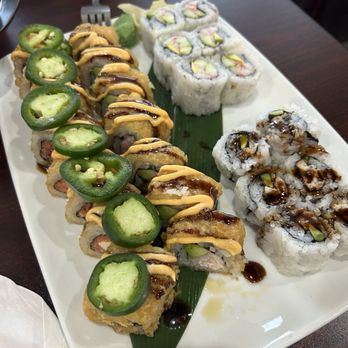 Sushi World by Oishii - Volcano roll, Deep sea roll (Left to right) California roll (Top right) Eel avocado roll (Bottom right) - Ramen Near Me - Burlington, North Carolina