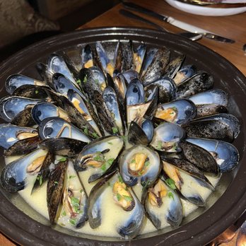 Maison Pucha Bistro - Mussels in Garlic Butter & Wine - French Near Me - Houston, Texas Maison Pucha Bistro - Mussels in Garlic Butter & Wine - French Near Me - Houston, Texas