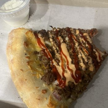Cuts & Slices - The one-bite in pic of the chopped cheese in January. Rookie pic - Pizza Near Me - Brooklyn, New York