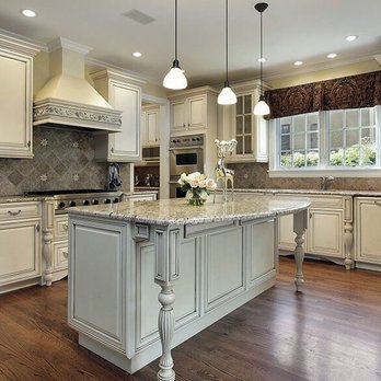 Gas Gone Blue Limestone Backsplash With Aspen White Granite