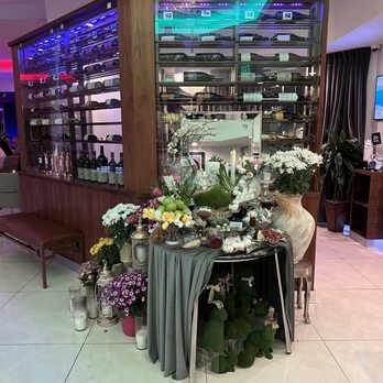 Caspian Mediterranean Kitchen - Restaurant Reception Entrance Wine Collection Wait Lounge - Persian/Iranian Near Me - Foothill Ranch, California