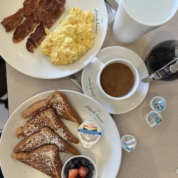 The French House - Pancake Breakfast includes two eggs and choice of meat. - Coffee & Tea Near Me - Houston, Texas The French House - Pancake Breakfast includes two eggs and choice of meat. - Coffee & Tea Near Me - Houston, Texas
