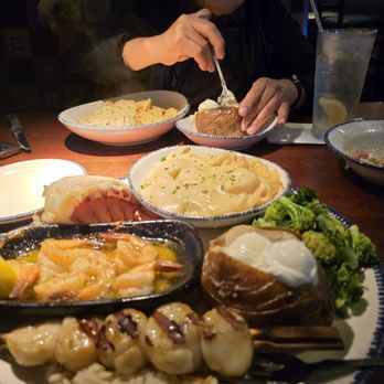 Red Lobster - Mom enjoying her baked potatoes and pasta - Seafood Near Me - Concord, North Carolina Red Lobster - Mom enjoying her baked potatoes and pasta - Seafood Near Me - Concord, North Carolina