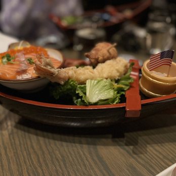 Wokuni - Kids meal. Fantastic presentation, and they had a little surprise snack inside the boat! - Japanese Near Me - New York, New York Wokuni - Kids meal. Fantastic presentation, and they had a little surprise snack inside the boat! - Japanese Near Me - New York, New York