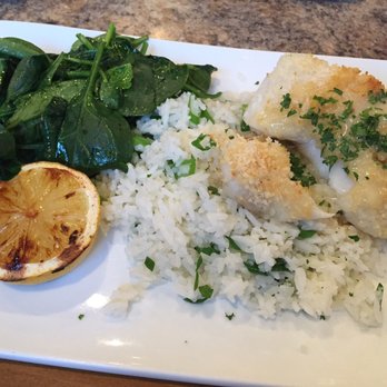 Chill Kitchen & Bar - Baked Haddock, served with jasmine rice and garlic spinach - Desserts Near Me - Marlborough, Massachusetts