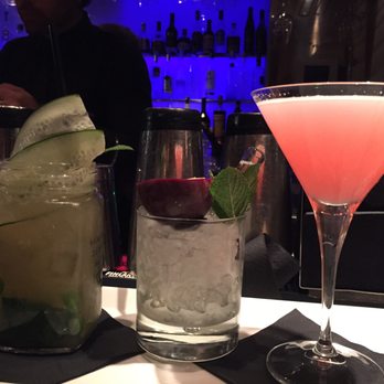 Oibò - On the left: Some sort of iced tea. Two on the right: Passion Fruit Martini - Lounges Near Me - Florence, FI
