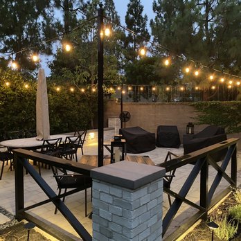 Williams Landscape Construction - Nighttime view of our backyard pavers, fencing, string lights, etc. The space is so useful! - Landscaping Near Me - Anaheim, California Williams Landscape Construction - Nighttime view of our backyard pavers, fencing, string lights, etc. The space is so useful! - Landscaping Near Me - Anaheim, California